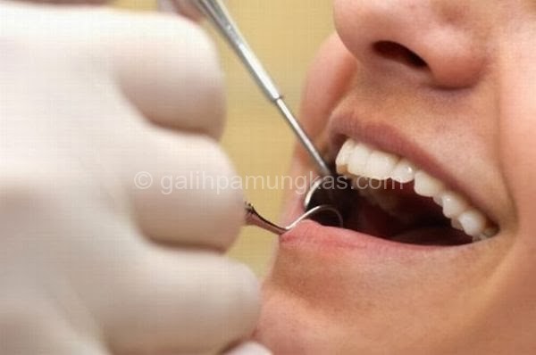 cara mengatasi sakit gigi